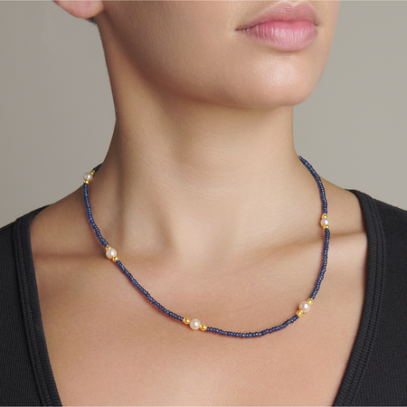 Woman wearing Ceylon Sapphire and Pearl Necklace 